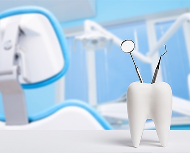 Model tooth holding dental treatment equipment in dental operatory