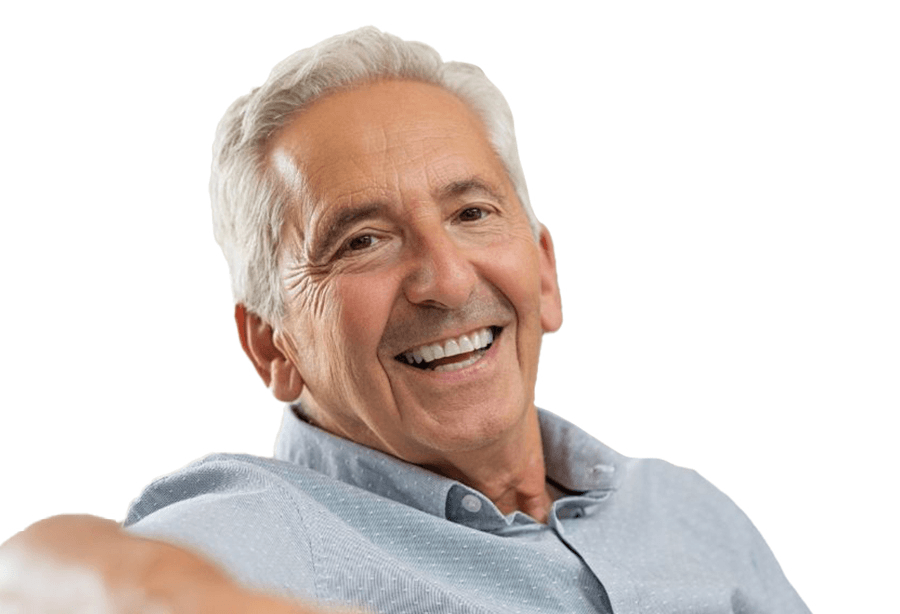 Man smiling after dental crown and fixed bridge restoration
