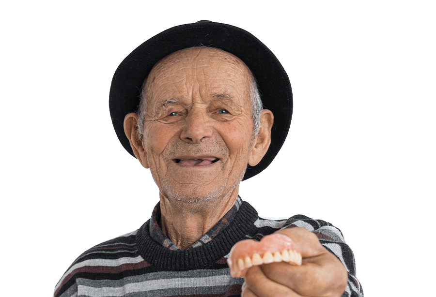 Man and woman with dentures smiling