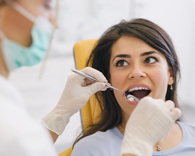 Woman relaxed during tooth extraction