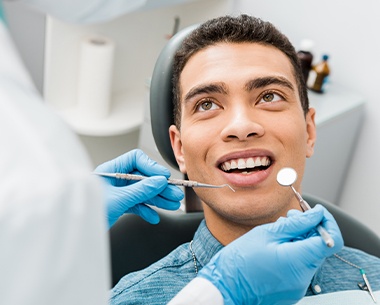 Man receiving dental treatment