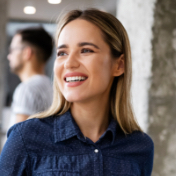 Woman vibrantly smiling