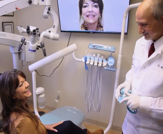 dentist talking to patient