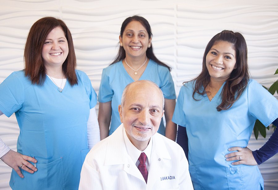 Doctor Makadia and his Bohemia dental team