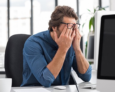 Tired man in need of treatment for snoring