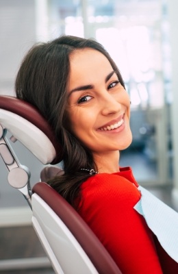 Woman sharing healthy smile during preventive dentistry visit