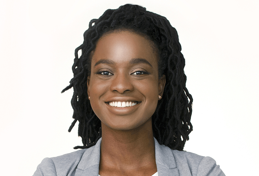 Young woman with bright smile after teeth whitening